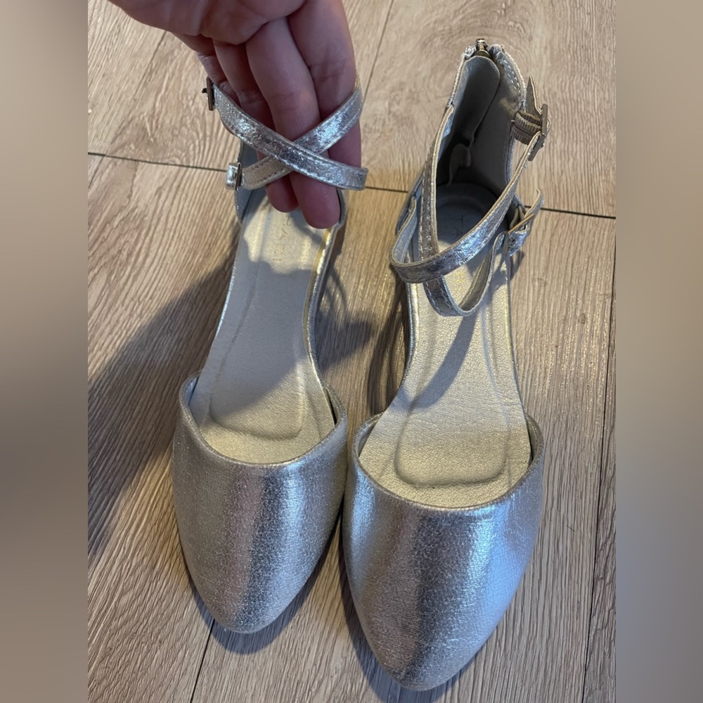 Silver dress shoes, size 4, worn twice. Good condition